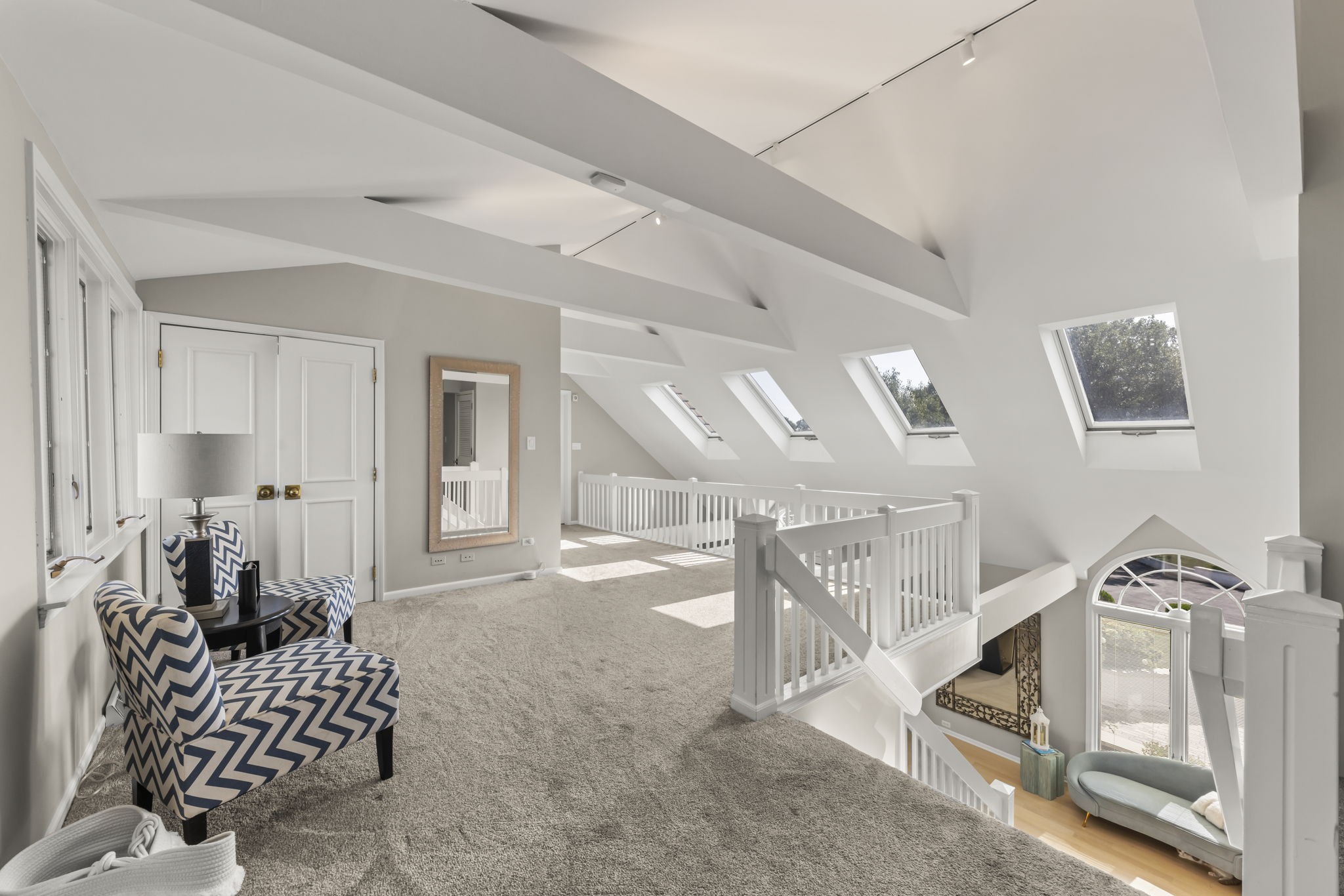 Naperville estate finished lower level recreation lounge at 23W735 Hobson Rd with custom wet bar, wine storage, blue-felt billiards table, fireplace, and marble tile floors